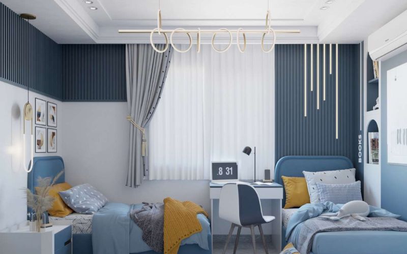 Phòng ngủ với màu tường chủ đạo xanh đậm, màu nội thất xanh nhạt