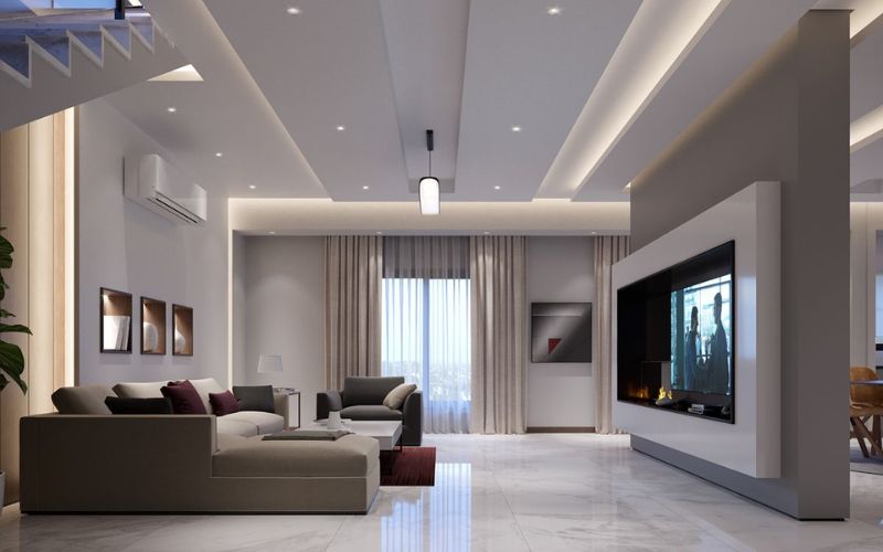 Mẫu vách thạch cao màu xám kết hợp kệ tivi tiện lợi cho phòng khách