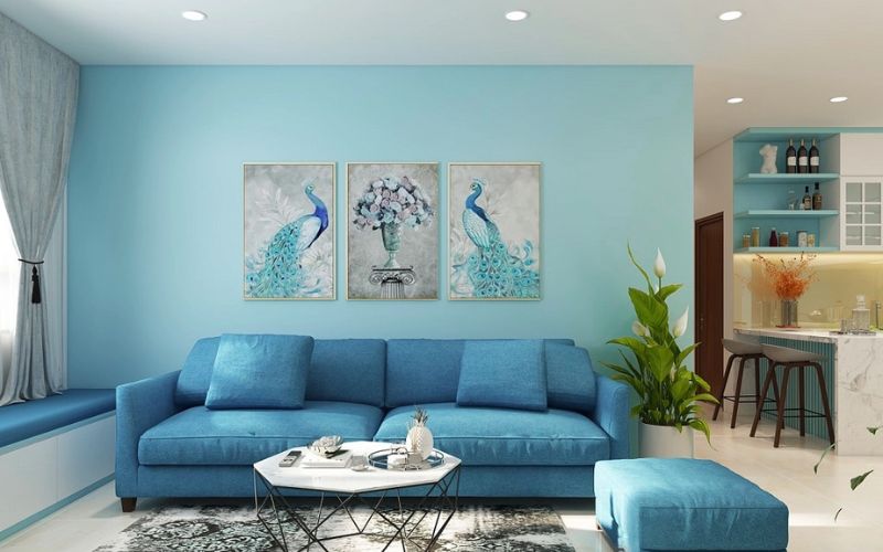 Phòng khách chung cư với màu xanh ngọc tạo cảm giác nhẹ nhàng