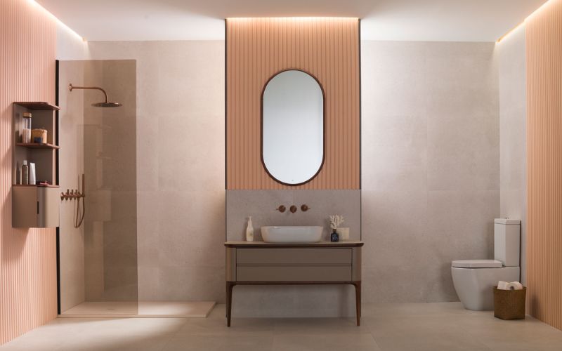 Thiết kế phòng tắm với vách kính, kết hợp tone hồng và nền xám tinh tế 