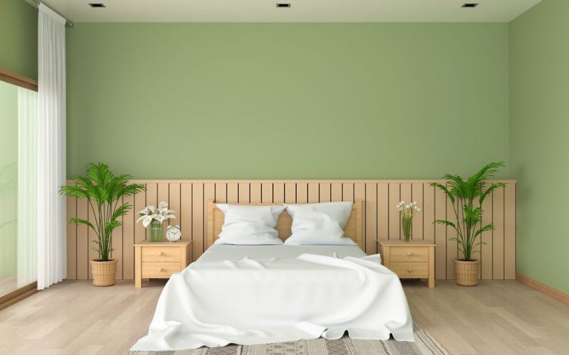 Mẫu phòng ngủ sơn nhà màu xanh lá cây kết hợp nội thất chất liệu gỗ tối giản