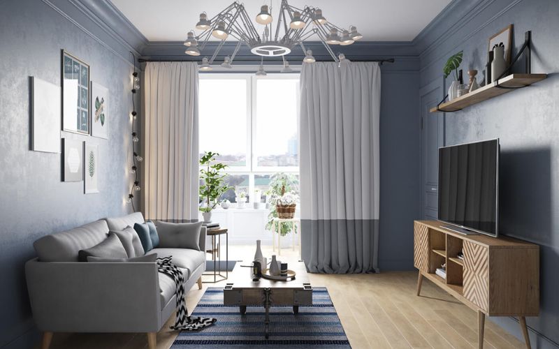 Phòng khách căn hộ chung cư màu xanh nước biển hiện đại