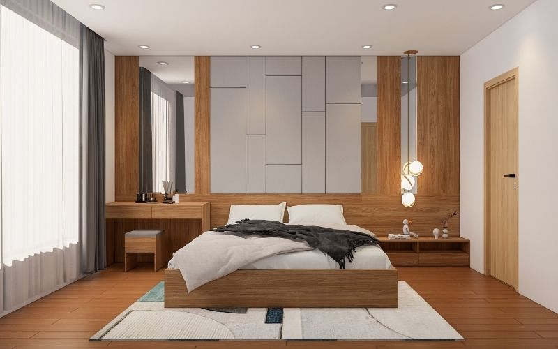 Tường phòng ngủ màu trắng kem sữa chủ đạo kết hợp sàn gỗ mang lại không gian nghỉ ngơi ấm cúng, thoải mái