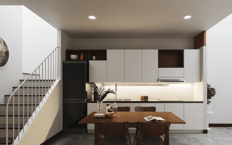 Khu bếp hiện đại với tủ bếp màu trắng sáng và các thiết bị inox bóng loáng