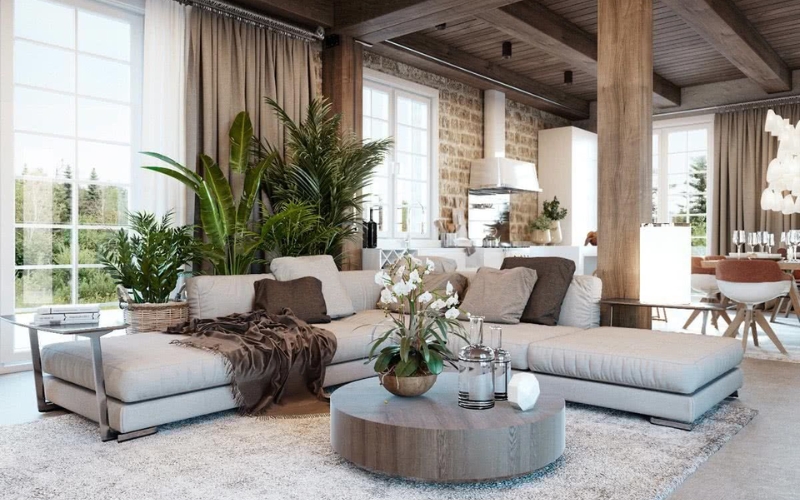 Phòng khách với sofa chữ L cây xanh và ánh sáng tự nhiên